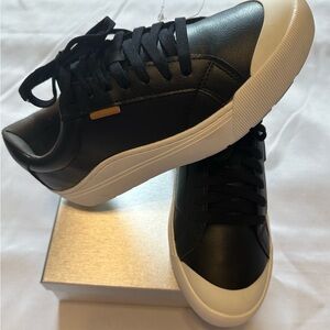 Sleek Black and White Women's Sneakers